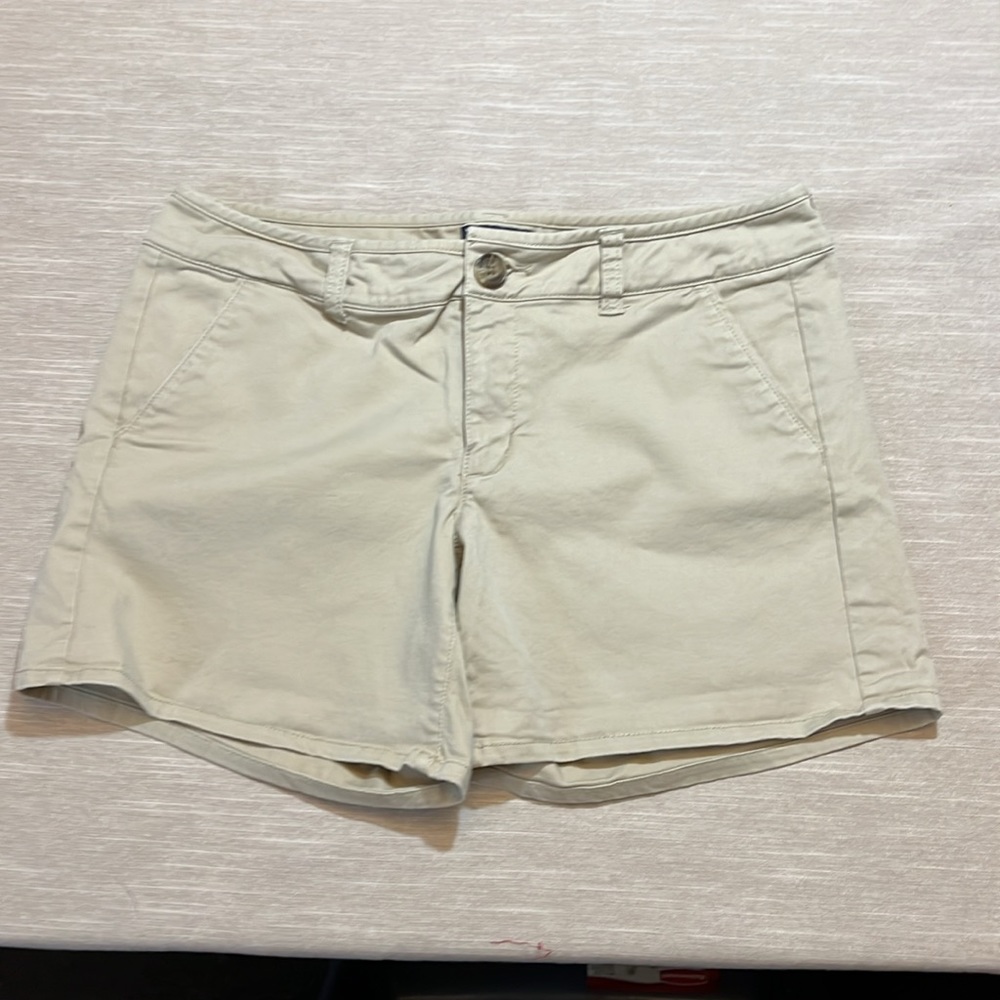 American Eagle Midi Stretch Khaki color shorts. Size 8. Waist 16” Inseam 5”